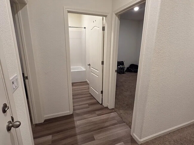 Building Photo - This stunning three-bedroom, two-bathroom home offers an incredible amount of space and upgrades,...