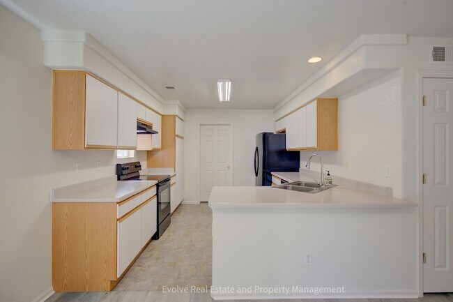 Building Photo - Evolve Real Estate: Bright & Spacious Home in Denver’s Green Valley Ranch! Available May 1st