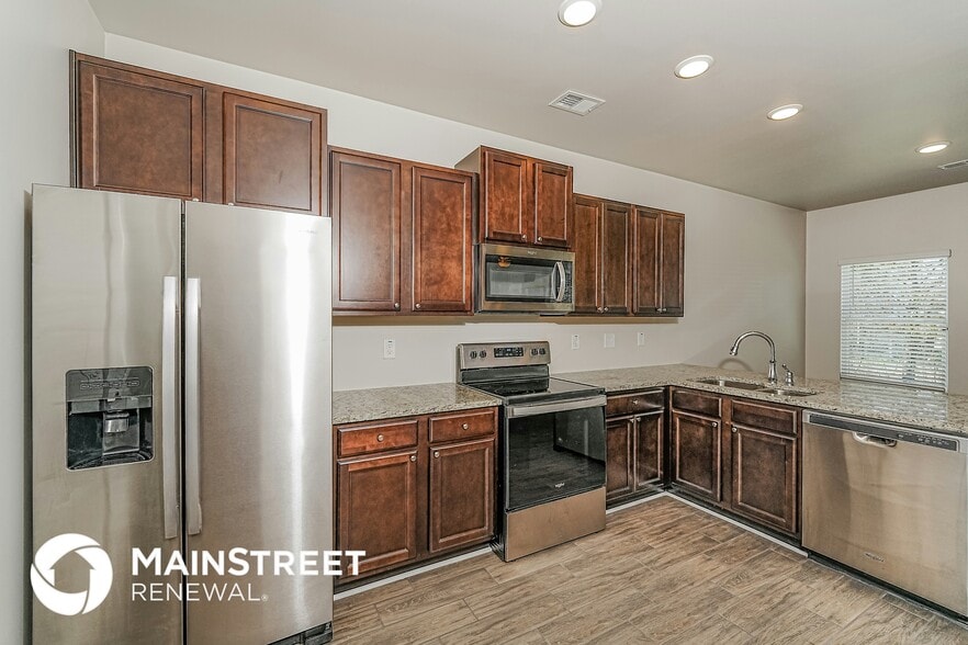 Building Photo - 5557 Cathwick Trc