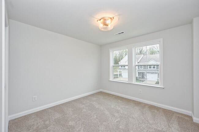 Building Photo - **BE THE LUCKY ONE TO LIVE IN THIS 2024-BUILT TOWNHOME**