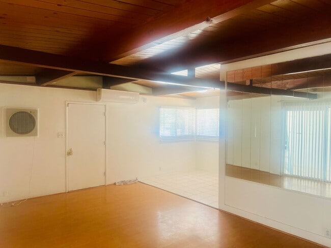 Building Photo - Charming 3-Bedroom Home with Wood Ceilings...