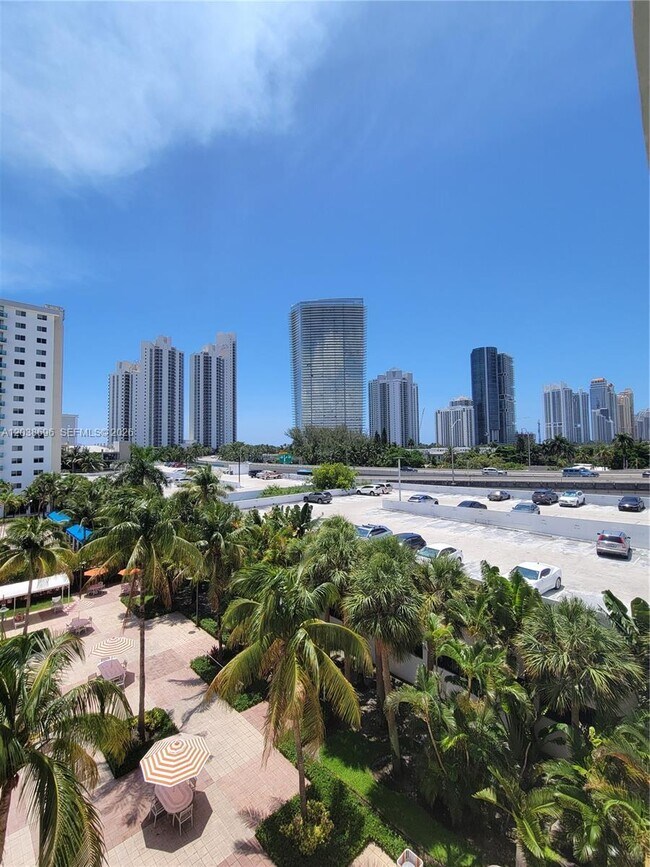 Building Photo - 19380 Collins Ave