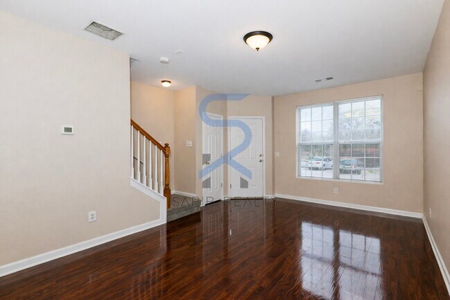 Building Photo - Move in before February 28th and choose your reward: a $250 Amazon Gift Card or a 55" Smart TV!