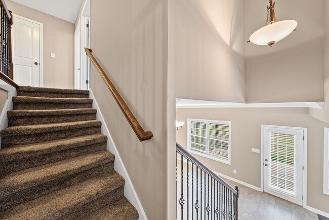 Building Photo - Four Bedroom with Three Car Garage!