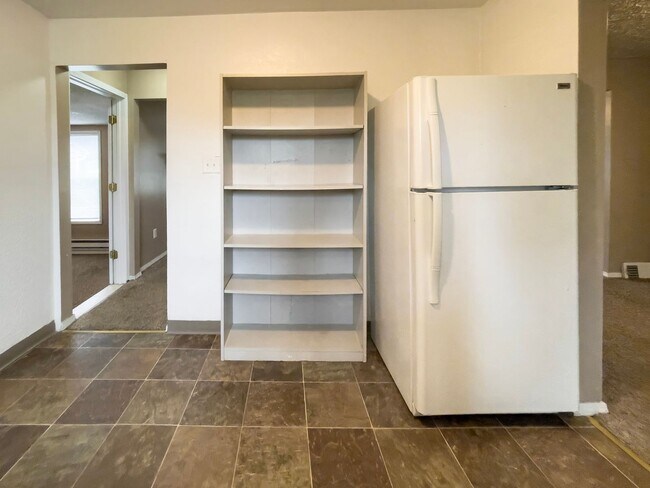 Building Photo - PRELEASING for AUGUST! Walk to Ball State! Bright 4BR Home with Fireplace