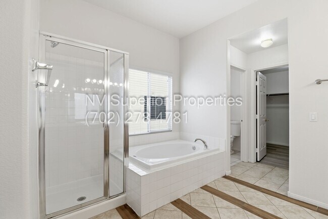 Building Photo - NW!! Single Story!!! 3 Car Garage!!  2 Masters!!! Low Maintenance desert landscape front yard!!  ...