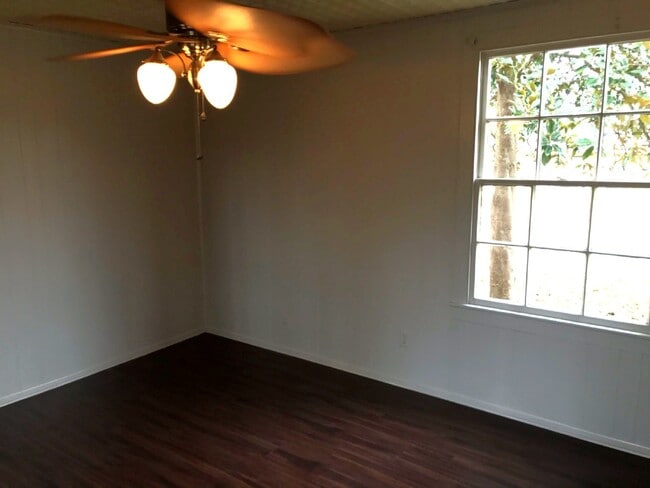 Building Photo - 3 Bedroom/1 bath home on corner lot with a large fenced back yard