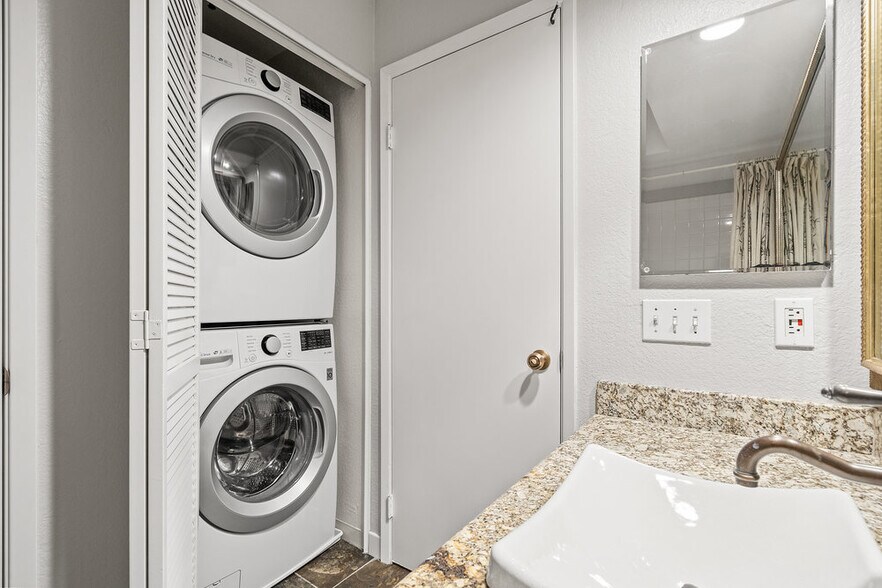 Hall bathroom seconds as laundry room - 86 Pelican Ln