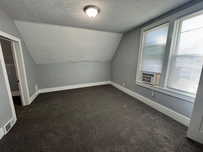 Building Photo - Coming Soon! 4 Bedroom Moline Rental, Pet ...