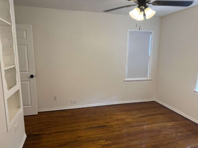 Building Photo - "Charming 4-Bed Lubbock Retreat: Granite Kitchen, Hardwood Elegance & Cozy Fireplace!"
