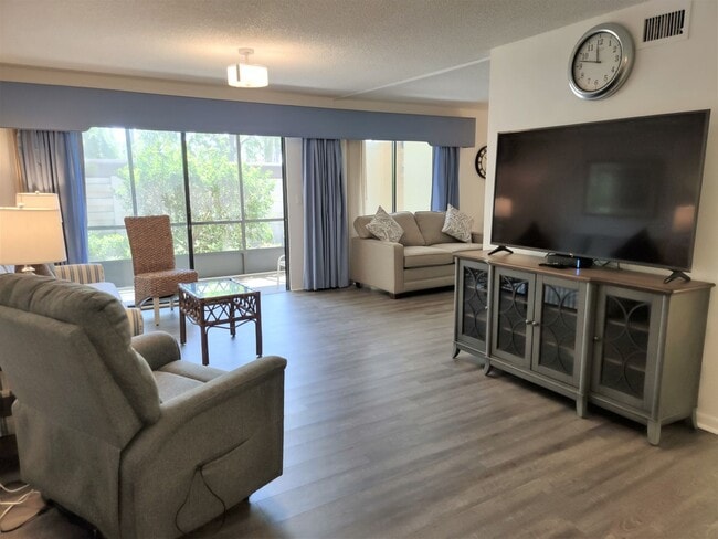 Building Photo - Bird Bay Village Annual Rental – Furnished 1st Floor Unit with Covered Parking