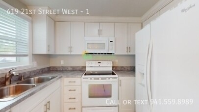 Building Photo - 619 21st St W