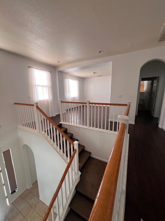 Building Photo - Available now! 5 Bedrooms and 4 full Bathr...
