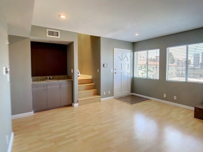 Building Photo - A Beautiful updated trilevel townhome in W Figueroa is now available for rent.