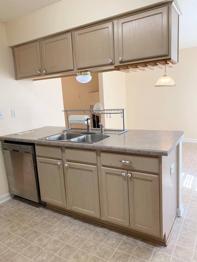 Kitchen, sink has disposal, plus dishwasher - 7985 Marsha Woods Dr
