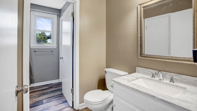 Building Photo - For Rent : 4BR, 1 1/2BA home with fenced in back yard and storage building.