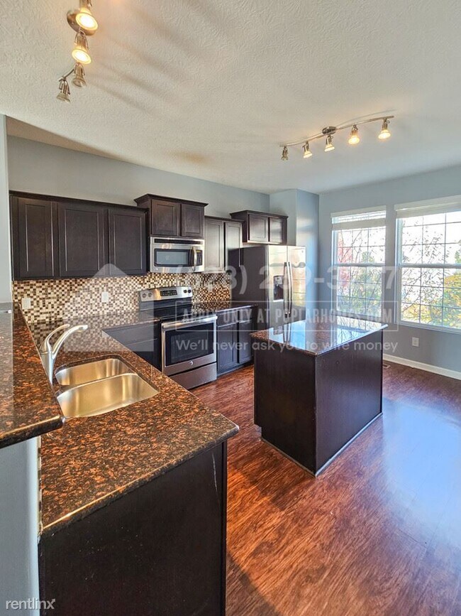 Building Photo - 2 br, 3 bath Townhome - 5927 Winberry Cree...