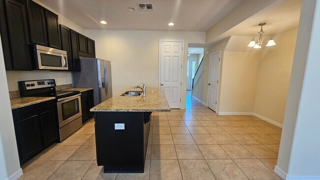 Building Photo - Spacious Randal Park Townhome