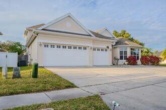 Building Photo - Spacious 5BR Home in Falcon Trace | 3-Car Garage | Screened Patio | Resort-Style Amenities Rent: ...