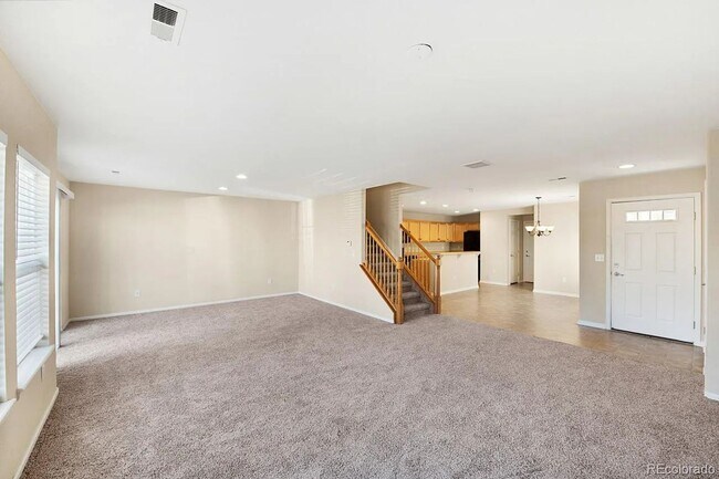 Building Photo - Bright Open-Concept Condo with 1-Car Garage in Prime Commuter Location