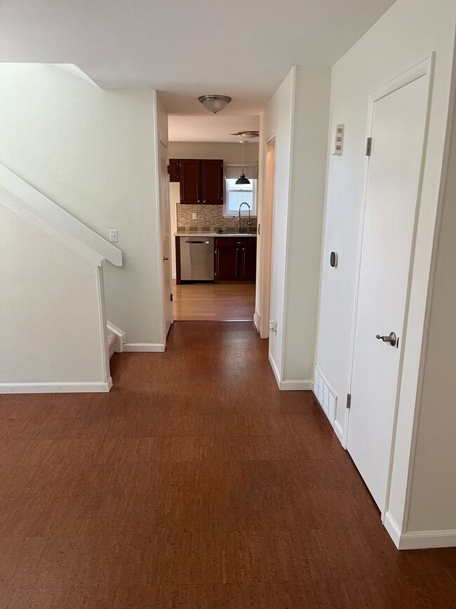 Building Photo - 4 Bedroom Gardener's Delight With Rooftop Patio, Privacy and Covered Parking