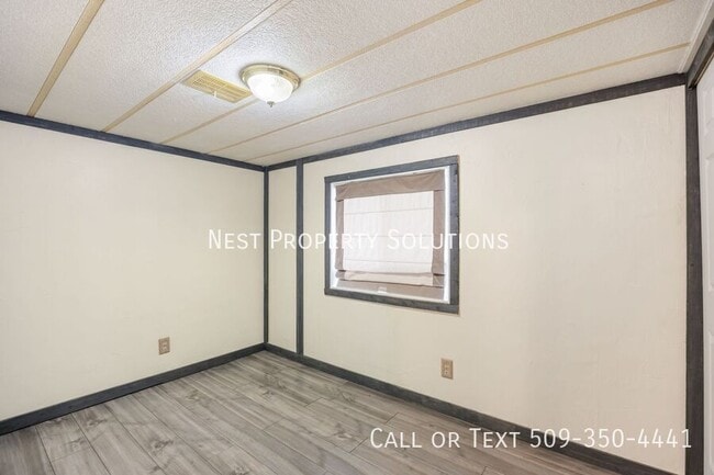 Building Photo - 16388 Rd I NE