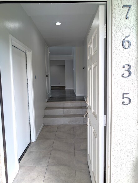 Entryway with direct access to garage - 7635 Birchleaf Ave