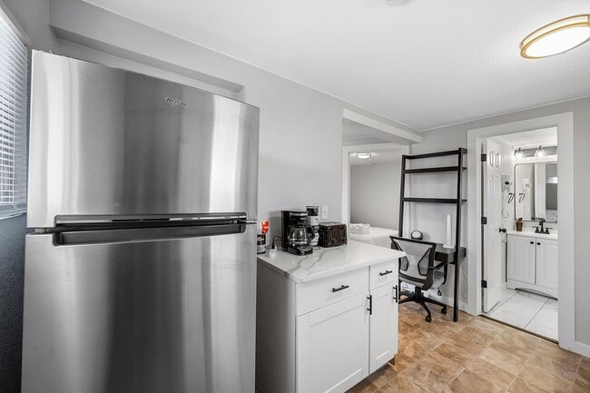 Building Photo - Remodeled and Furnished 1BD, 1BA in the Highlands with Off-Street Parking Spot