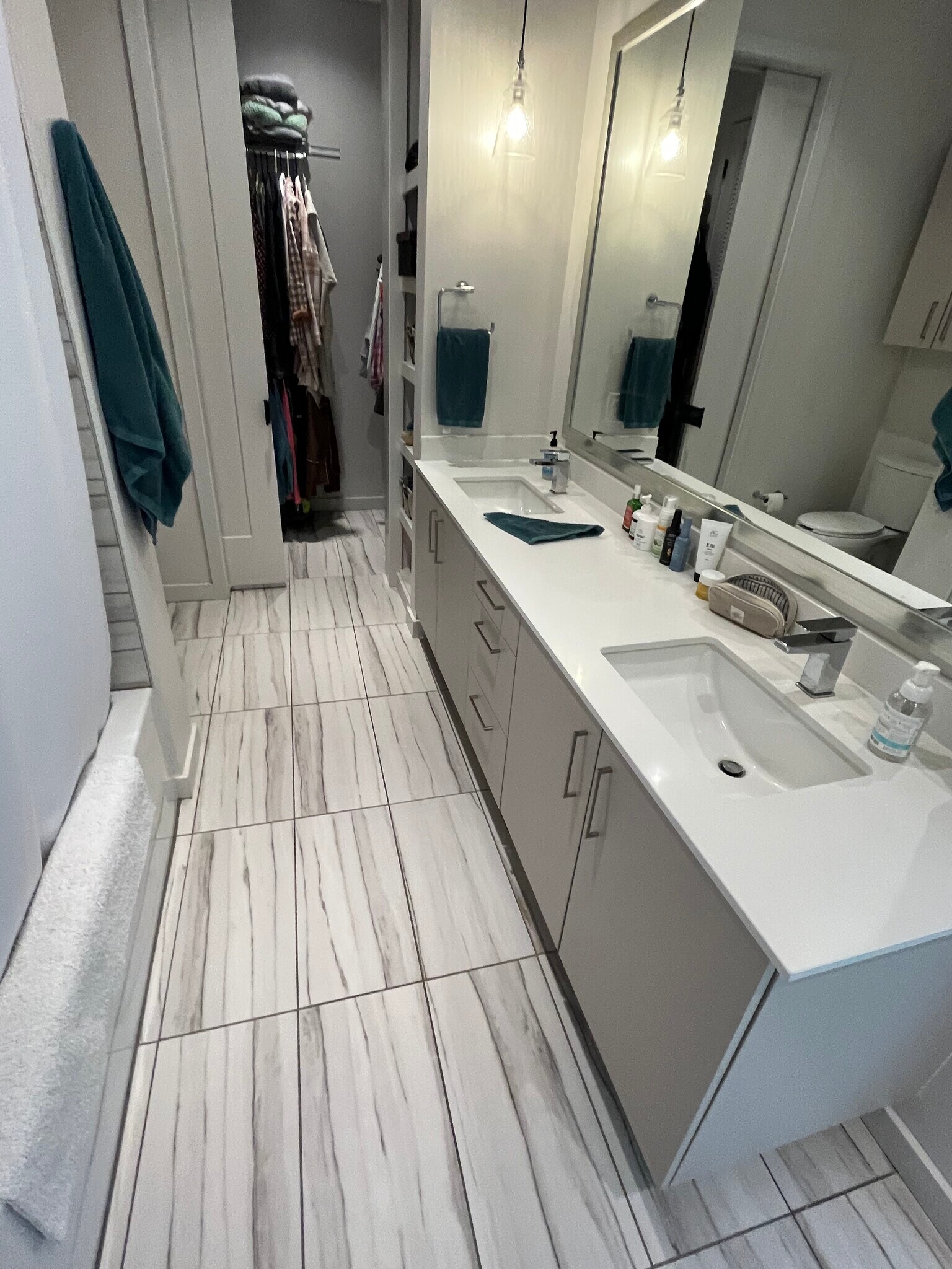 Walk in closet in double vanity sinks bathroom - 1501 E 4th St