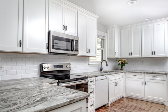 New Stainless Appliances and White Shaker Style Cabinets - 1408 E 48th St