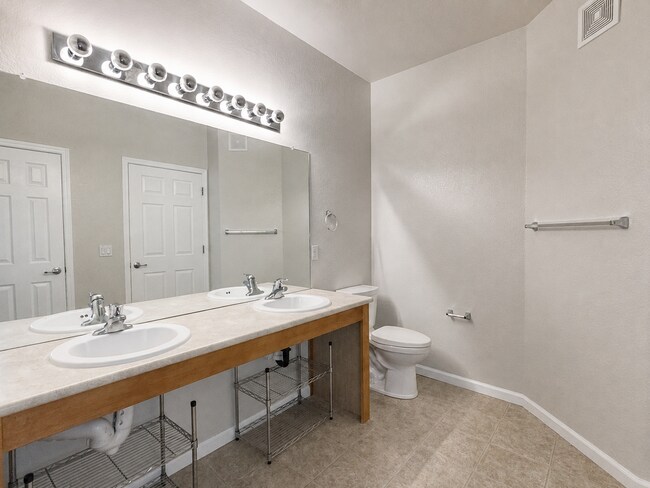 Building Photo - Spacious 2-Bedroom Condo with Garage, Fireplace, Pool & Most Included Utilities