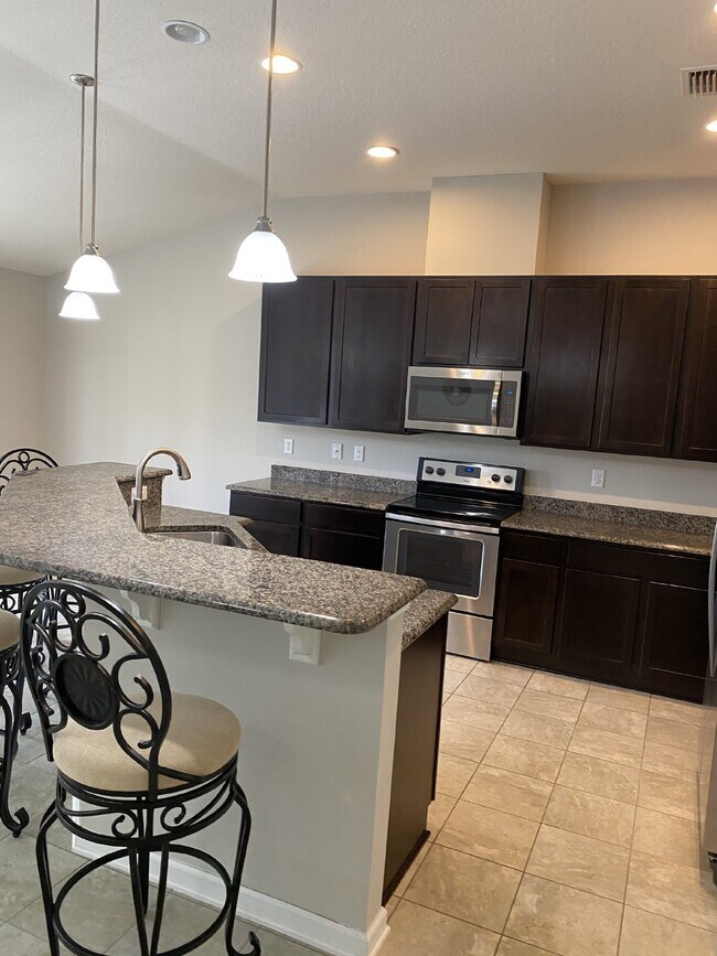 Building Photo - Elegant 4BR Home with Gourmet Kitchen, Smart Tech Package & Nature Views - Coming Soon