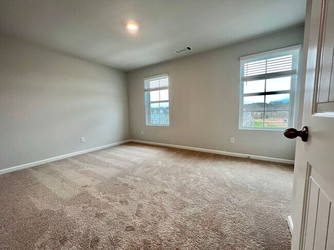Building Photo - New 3 Bedroom, 2.5 Bathroom Townhouse w/ C...