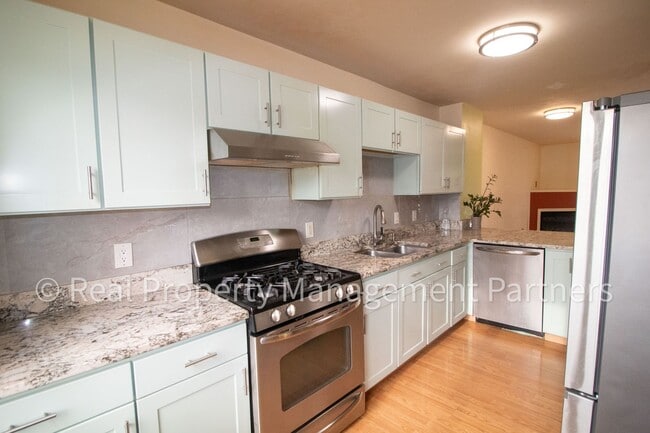 Building Photo - Forest Hills 3 Bed Townhome with Garage, Pond View and Some Utilities Included