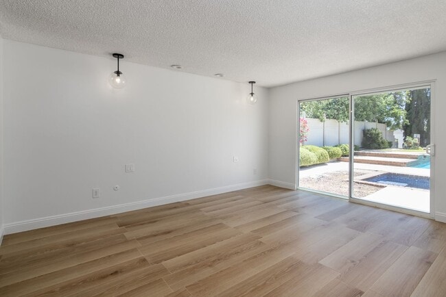 Building Photo - Spacious 3-Bedroom Home with Pool, Jacuzzi...
