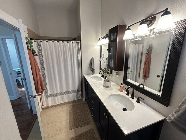 Building Photo - *COMING SOON* Updated Home Near Downtown – EV Charger, Office & Outdoor Oasis!