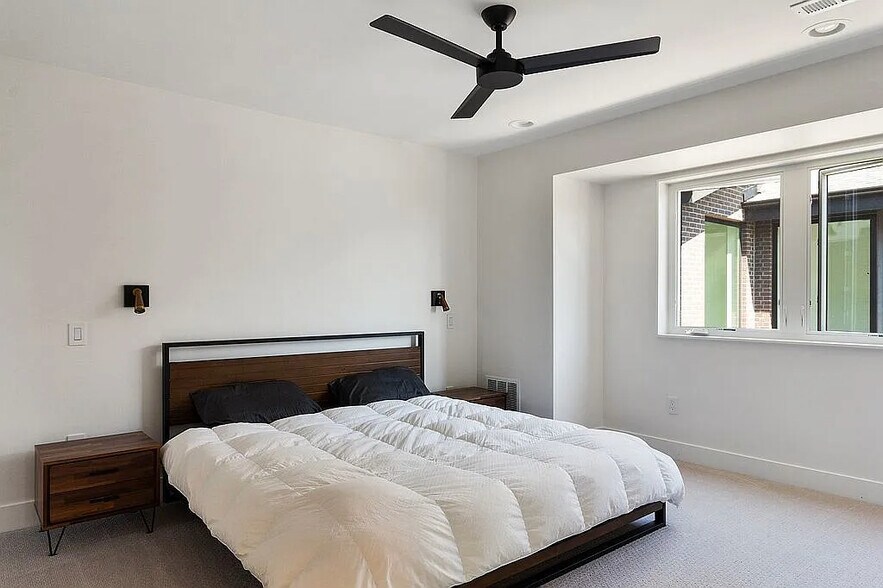 Master bedroom on second floor with ceiling fan - 963 Tennyson St