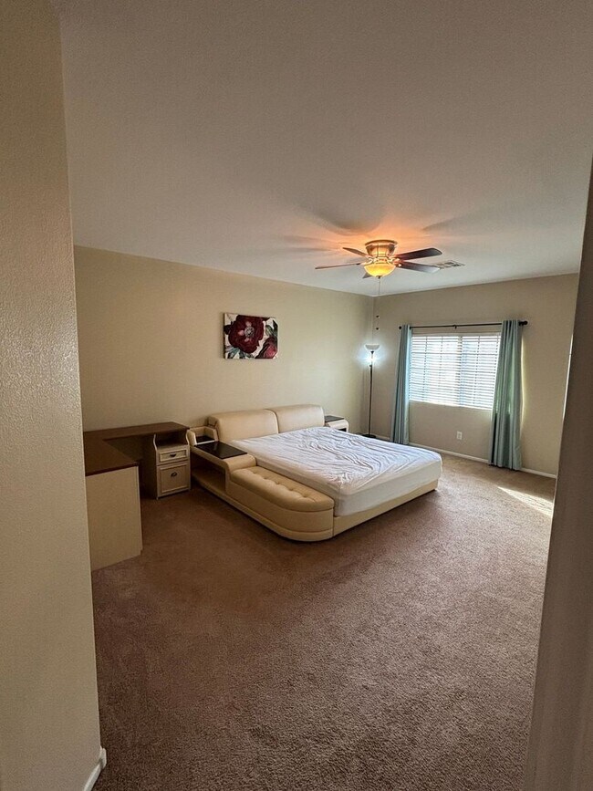 Building Photo - Gated 3-Bedroom Home with Community Pool Near Fort Apache & Blue Diamond