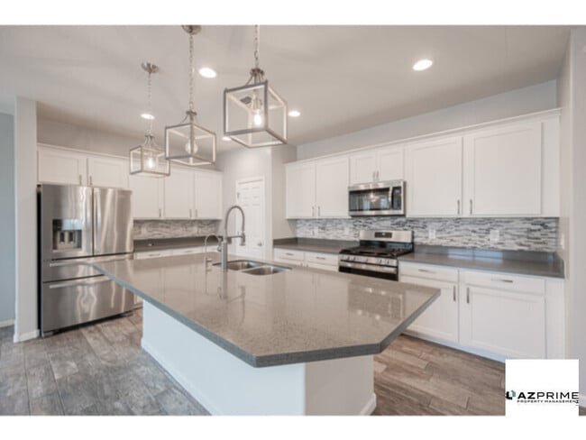 Building Photo - Discover Refined Peoria Living In This Stu...