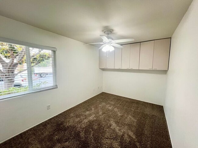 Building Photo - Stunning 4BR Townhome with Hardwood Floors, Private Patio, Community Pool & 2-Car Garage!