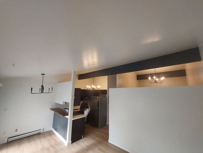 Building Photo - North Seattle 1BR with Private Balcony, Natural Light, and Modern Flooring