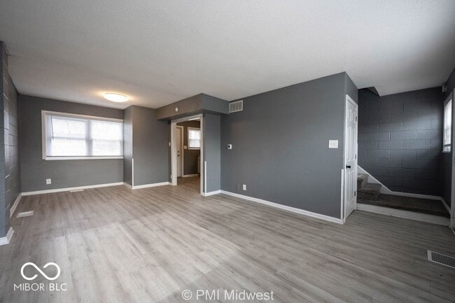 Building Photo - 6060 E 16th St