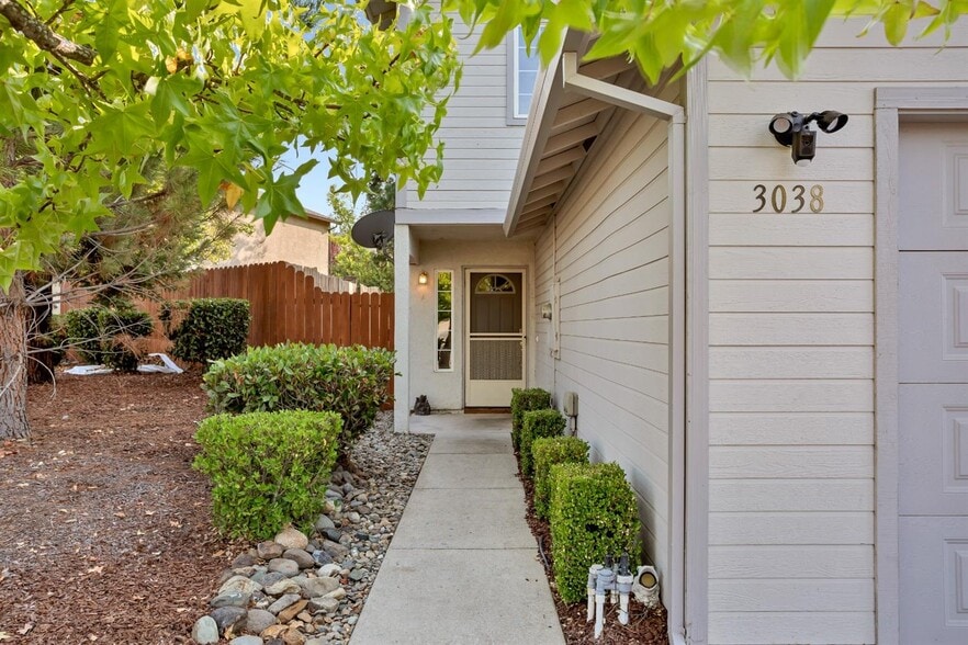 The front door of the home. - 3038 Courtside Dr