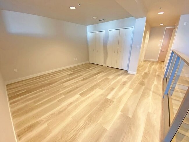 Building Photo - Live at The Axis High-Rise! Upscale, Urban...