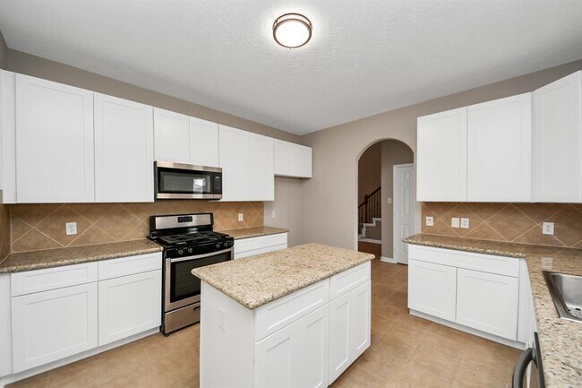 Building Photo - 7447 Oakwood Canyon Dr