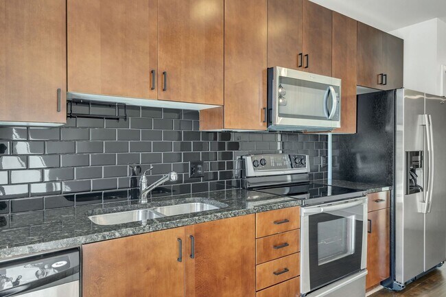 Building Photo - Stunning condo in the heart of SoBro at the Encore! Beautiful 1 bed, 1 bath on the amenity floor ...