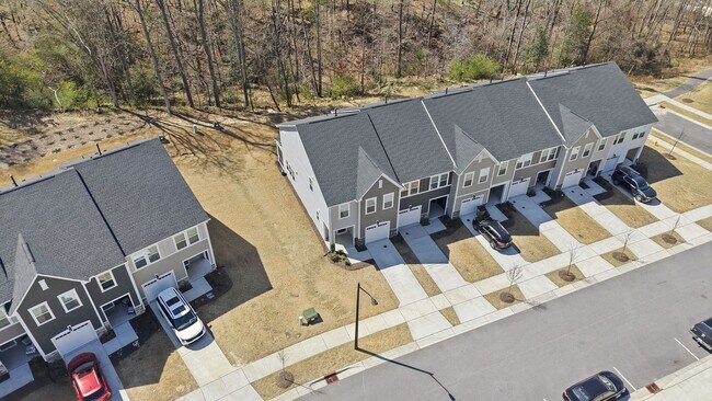 Building Photo - Upgraded 3BR Townhome in Wake Forest | Open Layout, Garage & Resort-Style Amenities