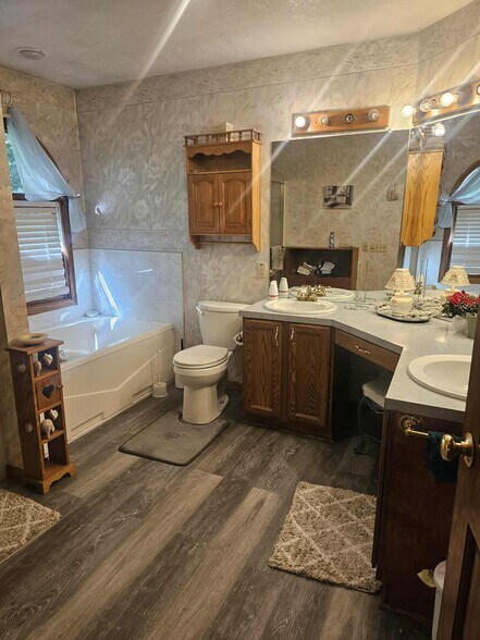 Bathroom with a jacuzzi tub and separate shower - 3424 Martindale Rd NE