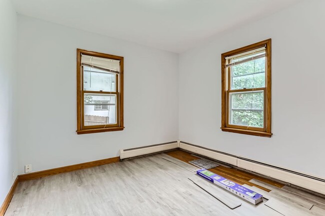 Building Photo - Lovely 4BR Home on a Quiet, Tree-Lined Street