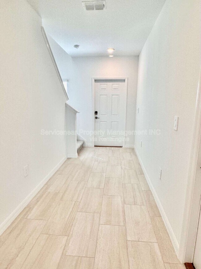 Building Photo - 8406 Blue Wave Ln E